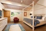 Top-floor primary suite features king, walk-in closet and AC unit 